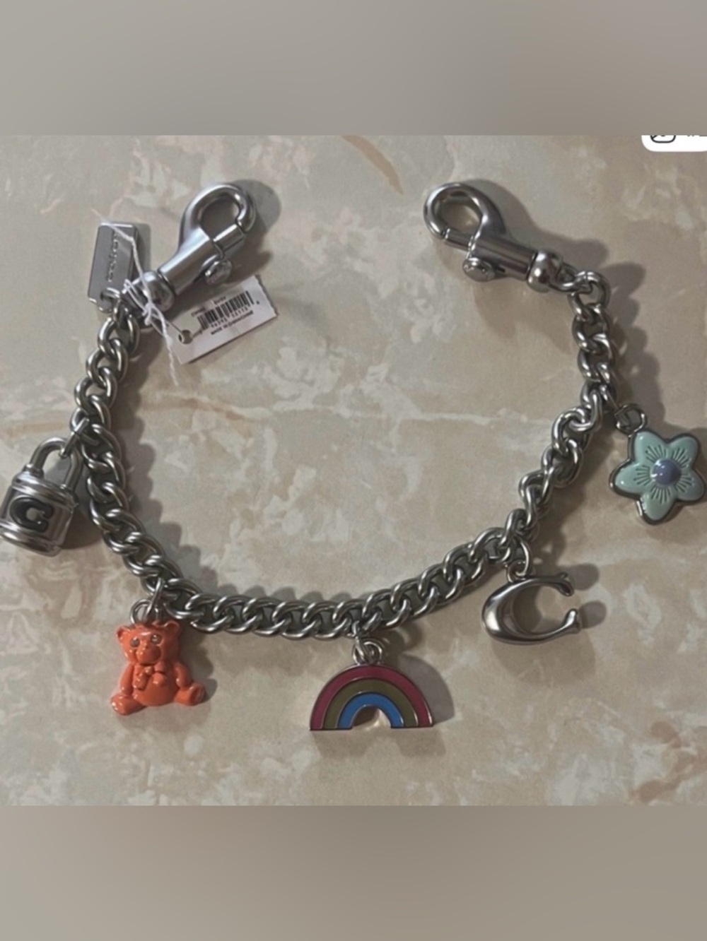 Coach Silver-Tone Charm Strap with Orange Bear & Multicolor Rainbow and More